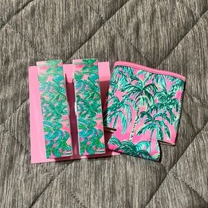 Lilly Pulitzer, towel clips, and cozie. Never been used.